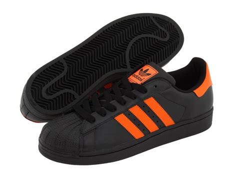 adidas schuh schwarz mit oranger sohle|Orange Schuhe .